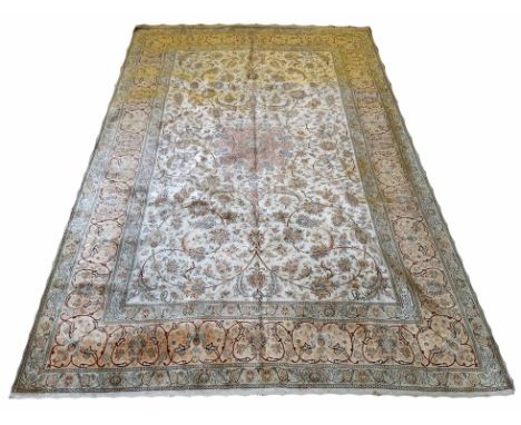 TEHRAN DESIGN CARPET, 283cm x 183cm, pure silk shah abbas design, medallion on ivory field, gold leaf border.