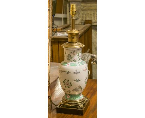 LAMPS, a pair, ceramic famille rose pattern vase form and gilt metal mounted, with shades, 81cm H. (2)