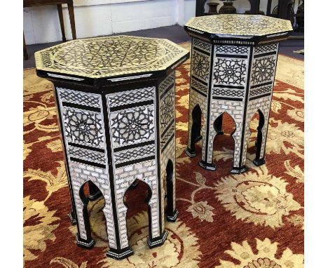 DAMASCUS LAMP TABLES, a pair, mother of pearl inlaid, of octagonal form, with Mihrab supports, 42cm W x 42cm D x 61cm H (with