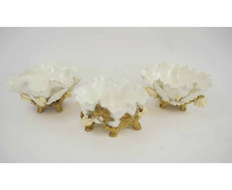 THREE LATE 19TH CENTURY CERAMIC BON BON DISHES, of naturalistic design by Moore Bros, each 15cm L x 12cm x 8cm H. (3)