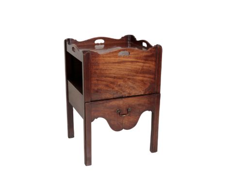 A GEORGE III MAHOGANY TRAY TOP COMMODE circa 1765, the serpentine gallery front, back and sides all with pierced handles, the