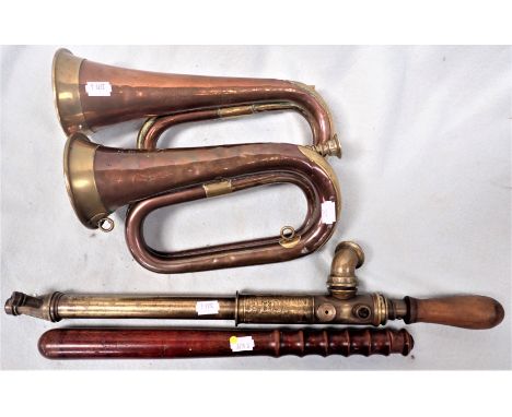 A BUGLE BY HAWKES &amp; SON 27cm long, with another bugle, a truncheon, and a vintage brass garden sprayer (4)