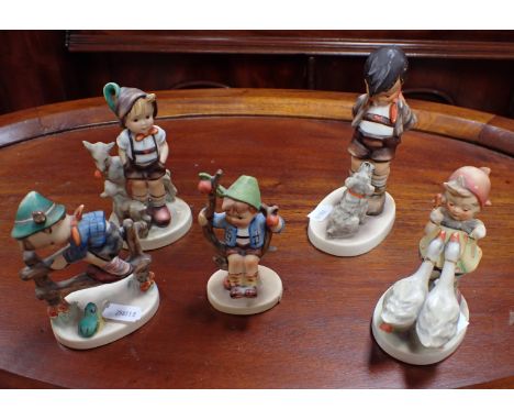 FIVE GOEBEL HUMMEL FIGURES (some small paint loss)