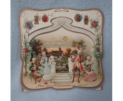 AN EDWARDIAN HOLD-TO-LIGHT CHRISTMAS CARD a garden scene