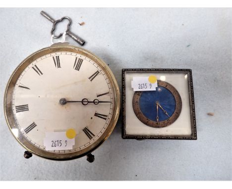 AN ART DECO SWISS CLOCK with an enamel face, 7cm high (glass chipped), with a brass drum clock (2)