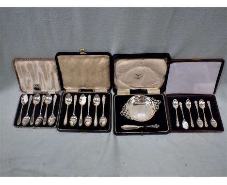 THREE CASED SETS OF SILVER TEASPOONS, AND A SILVER BUTTER DISH and knife (cased)