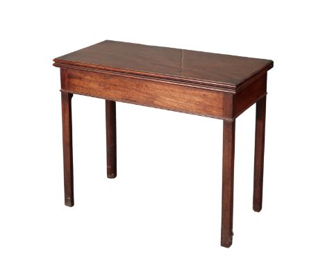 A GEORGE III MAHOGANY CARD TABLE The rectangular folding top enclosing a green baize-lined interior, with concealed drawer, 7