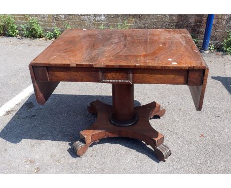 A REGENCY ROSEWOOD SOFA TABLE on platform base 88cm wide