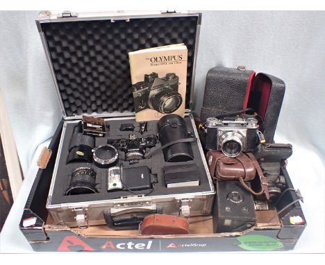 AN OLYMPUS OM-1 CAMERA, CASED WITH ACCESSORIES and other cameras