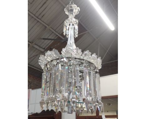 A MOULDED AND CUT GLASS FOUR LIGHT ELOCTROLIER in the Regency style, approx 80cm high 