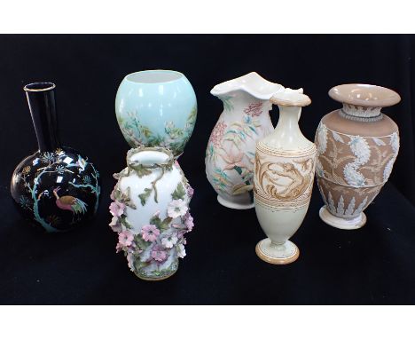 A COLLECTION OF DECORATIVE CERAMIC VASES mostly damaged