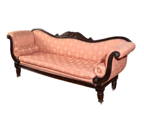 A WILLIAM IV CARVED AND STAINED WOOD AND UPHOLSTERED SOFA circa 1835, the serpentine toprail of the backrest with confronting