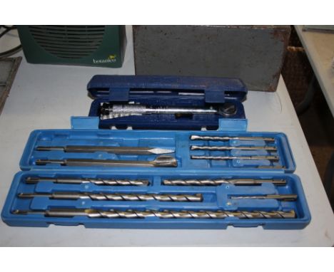 A Draper torque wrench and a Hilka 12 piece chisel and drill bit set