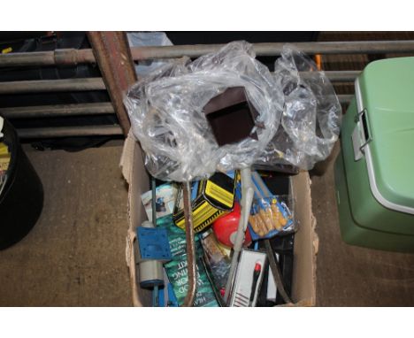 A box of various hand tools