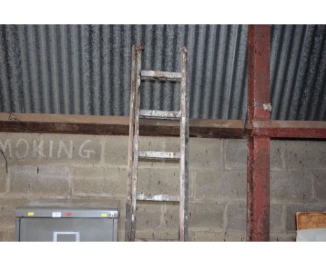 A wooden extending ladder 