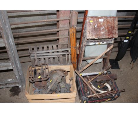 A small set of wooden steps; a tripod; two boxes of various metal ware 