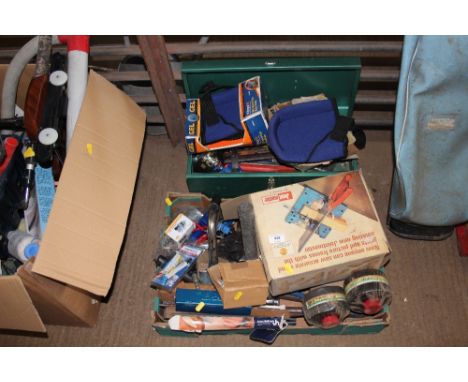 A metal tool box with contents of tools and knee pads together with a box of various tools