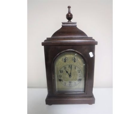 A German bracket clock on bun feet 