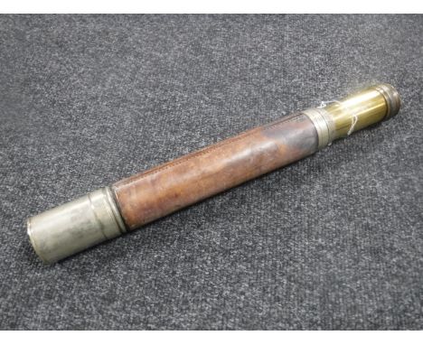 A World War II leather sleeved brass telescope by W Ottway &amp; Co. Ltd No. 5910.