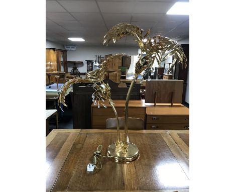 A brass two way table lamp in the form of a palm tree 