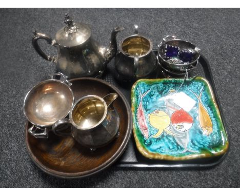 A tray of glazed pottery fish plate, shallow Edwardian wooden bowl together with a plated three piece tea service, twin handl