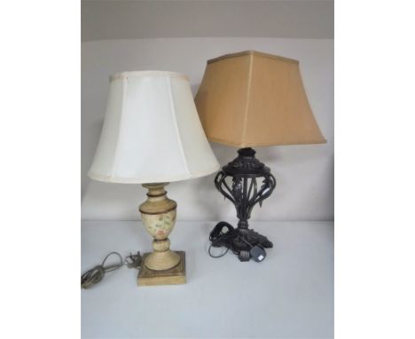 A decorative metal table lamp with shade together with a painted wooden table lamp with shade 