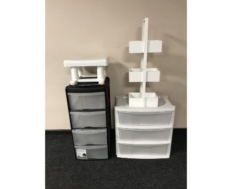 Three plastic storage chests together with a wooden caddy and a plastic stool 