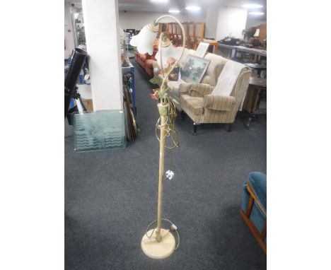 A two-way standard lamp with glass shades leaf design 