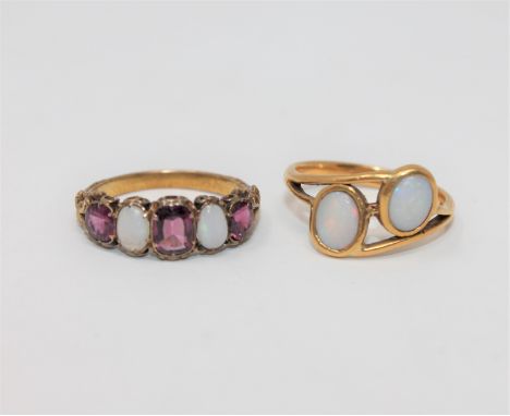 A Victorian garnet and opal set ring, together with a 22ct gold opal set ring  CONDITION REPORT: Victorian ring - 2.5g. 22ct 