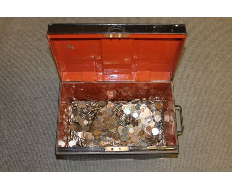 A large vintage tin containing a large quantity of pre-decimal coins