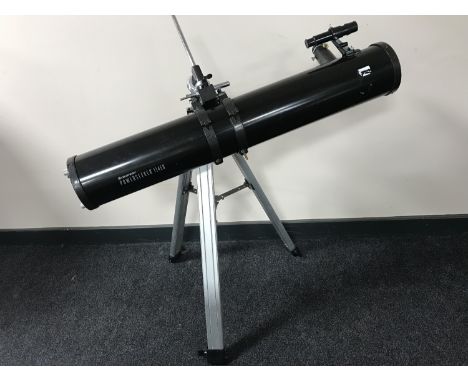 A Celestion Power Seeker 114EQ telescope on stand together with a set of 8x60 binoculars 