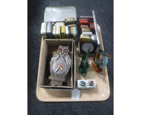 A tray of vintage tins, Pico wall clock in the form of an owl, cased servers, two glass fish, together with a piece of Killar