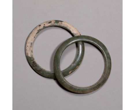Jade Ring in Hongshan period   Diameter：6cmWeight：29g