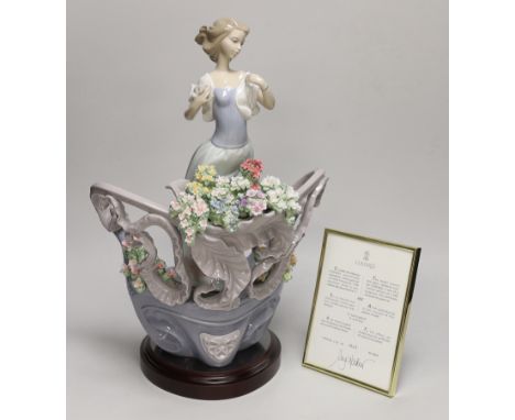 A Lladro porcelain table centrepiece, ‘’Love’s first light’’, number 01862, sculpture Joan Coderch, one of 1500, with origina