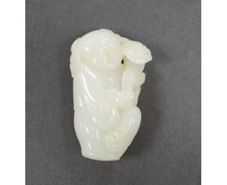 A Chinese white jade boy with ruyi sceptre, 7cm