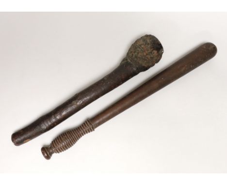 A truncheon with turned handle and a hardwood knobkerrie, the largest 47cm in length