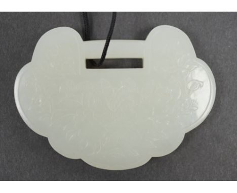 A Chinese pale celadon jade lock pendant, 19th/20th century, 8cm