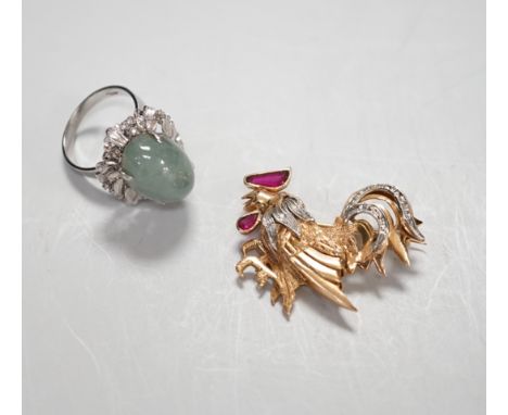 A modern 750 yellow metal and gem set cockerel brooch, 35mm, gross weight 8 grams and a white metal (stamped 14k) and cabocho