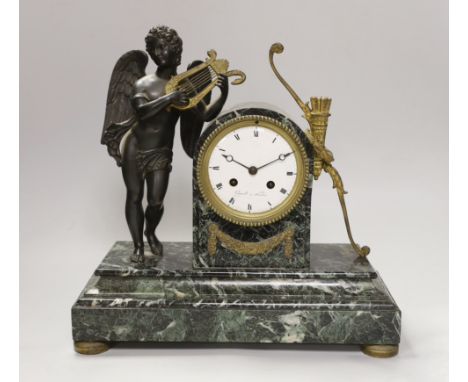 An early 19th century French ormolu and marble mantel clock in the form of Apollo, the enamel dial inscribed, Gigault A Nante