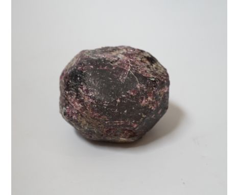 An unpolished and uncut garnet boulder, approx. 6cm.