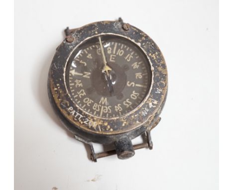 An RAF WWII aviation compass, for Pilots or Navigators, c. 1930s, PATT. 261, No. 411 W, 7cm diam.