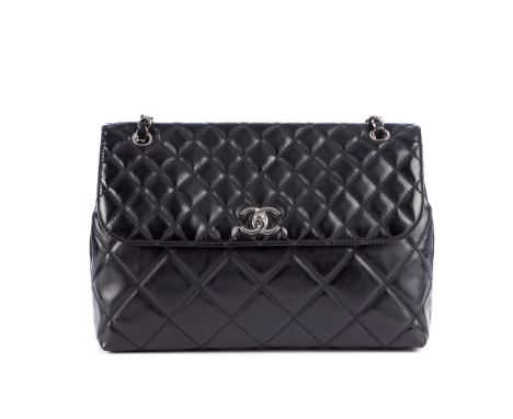Chanel, a black quilted Single Flap handbag, featuring maker's signature diamond quilted leather exterior, with silver-tone h