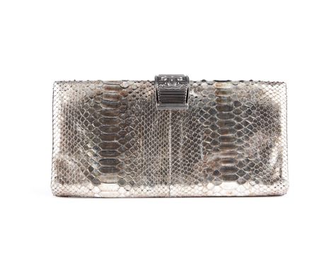 Chanel, a rare limited edition python skin clutch, featuring a metallic python skin exterior, with silver-tone CC clasp faste