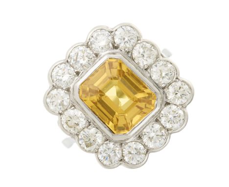 A platinum rectangular-shape yellow sapphire and brilliant-cut diamond cluster ring, sapphire estimated weight 3ct, estimated