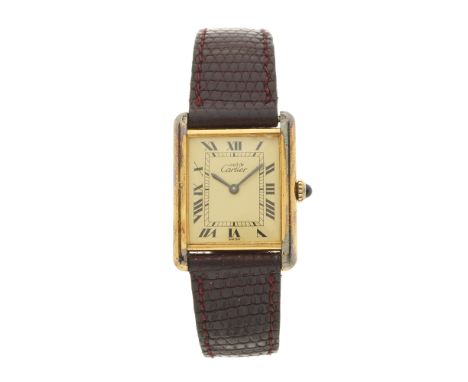 Cartier, a silver gilt Must de Cartier Tank wrist watch, manual wind movement, case numbered 6 032266, Swiss convention marks