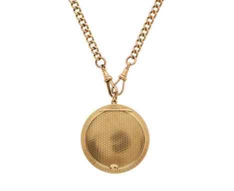 An Art Deco 9ct gold engine turned powder compact, suspended from a 9ct gold Albert chain, compact with hallmarks for London 