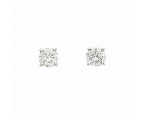 A pair of platinum brilliant-cut diamond single-stone stud earrings, estimated total diamond weight 0.50ct, J-K colour, VS2-S