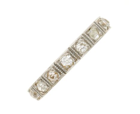 A mid 20th century 18ct gold old-cut diamond full eternity ring, with engraved sides, estimated total diamond weight 1ct, J-K