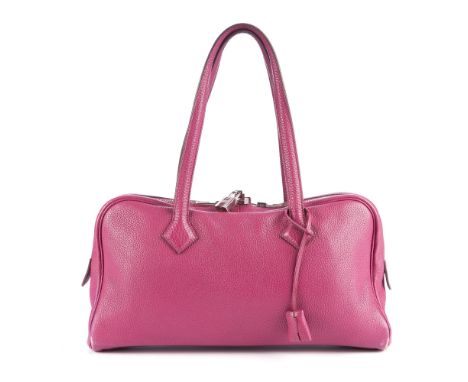 Hermes, a 2000 Victoria 35 Boston handbag, crafted from purple grained Togo leather, with dual flat top handles, double wrapa
