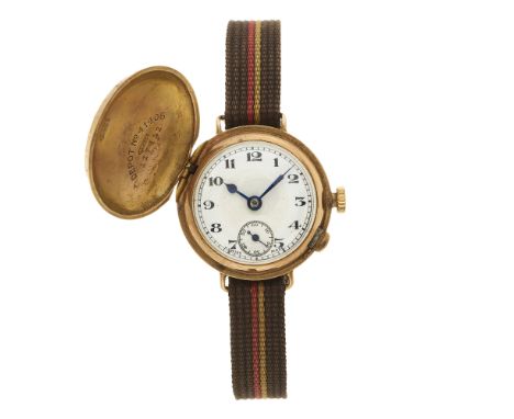 Dunlop, a rare Art Deco 9ct gold golf ball wrist watch, hinged cover opening to reveal an Arabic numeral dial, unsigned manua